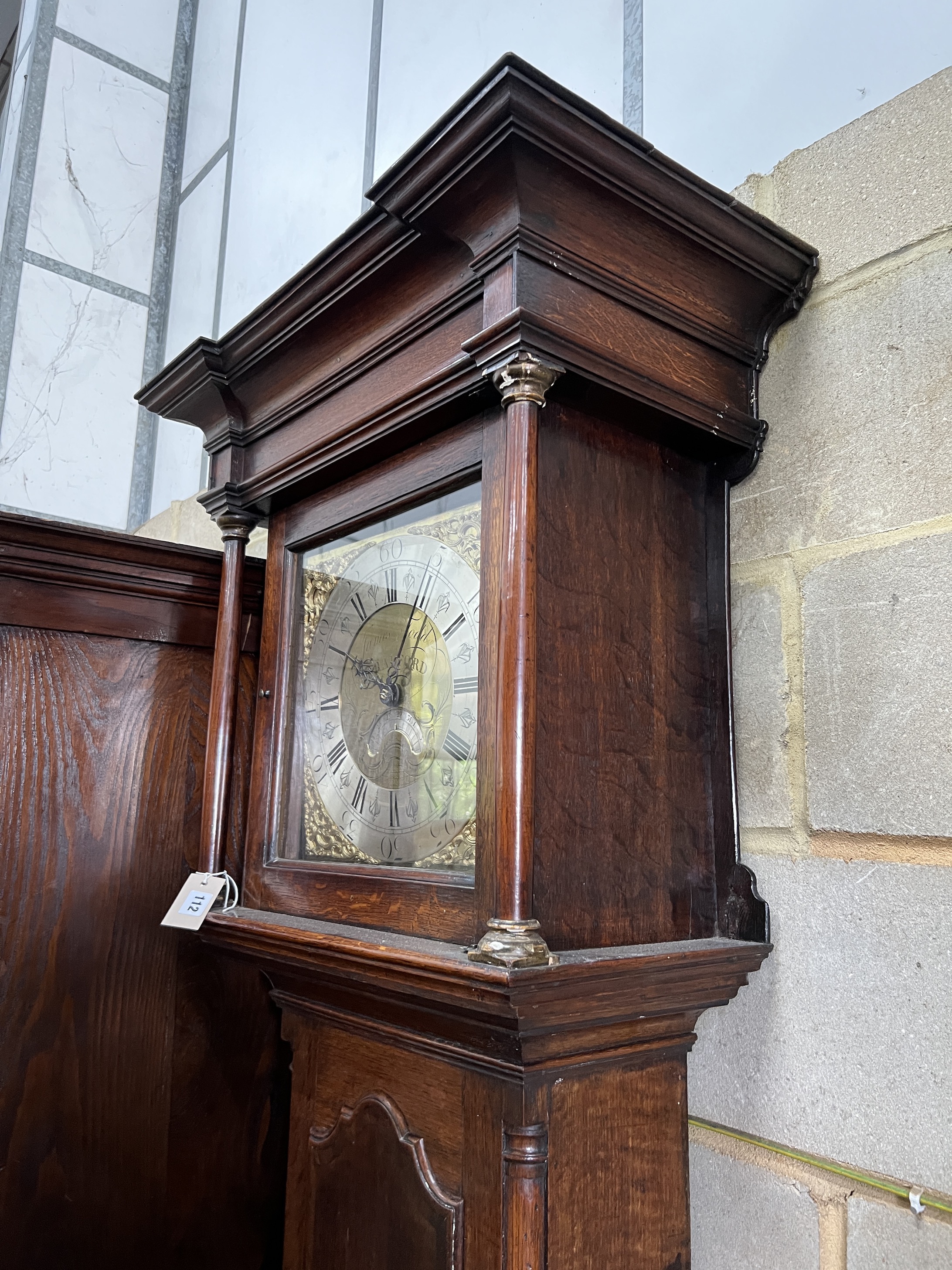 A George III inlaid oak thirty hour longcase clock, marked James Todd, Bradford, height 220cm